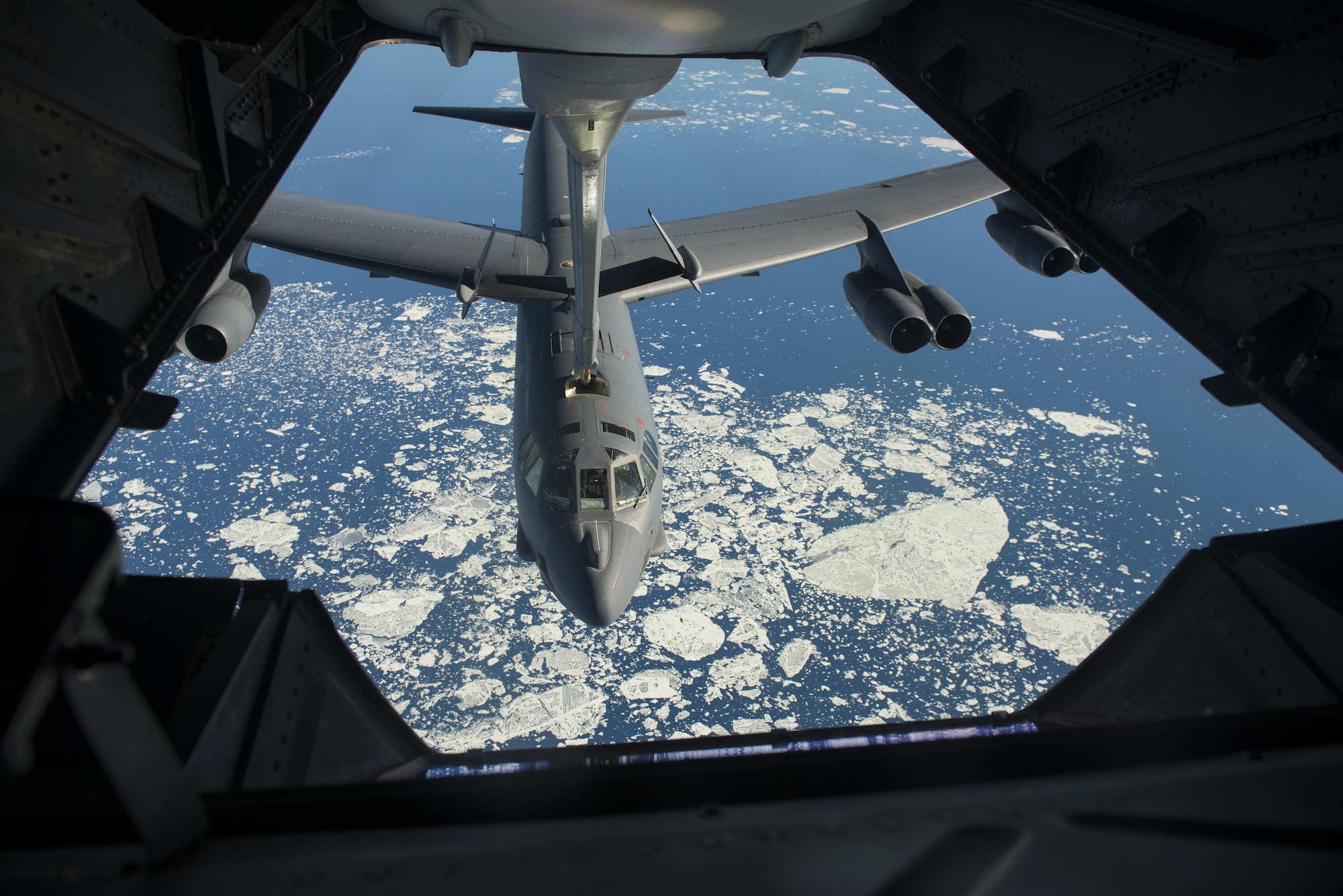 A B-52 Stratofortress from Minot Air Force Base, N.D. receives fuel from a 305th Air Mobility Wing, Joint Base McGuire-Dix-Lakehurst, N.J. during Polar Roar, a strategic deterrence exercise, in the skies near the North Pole, July 31. The rapid global mobility and air refueling capabilities of Air Mobility Command and the 305th Air Mobility Wing, ensured the B-52’s were able to complete their mission. 