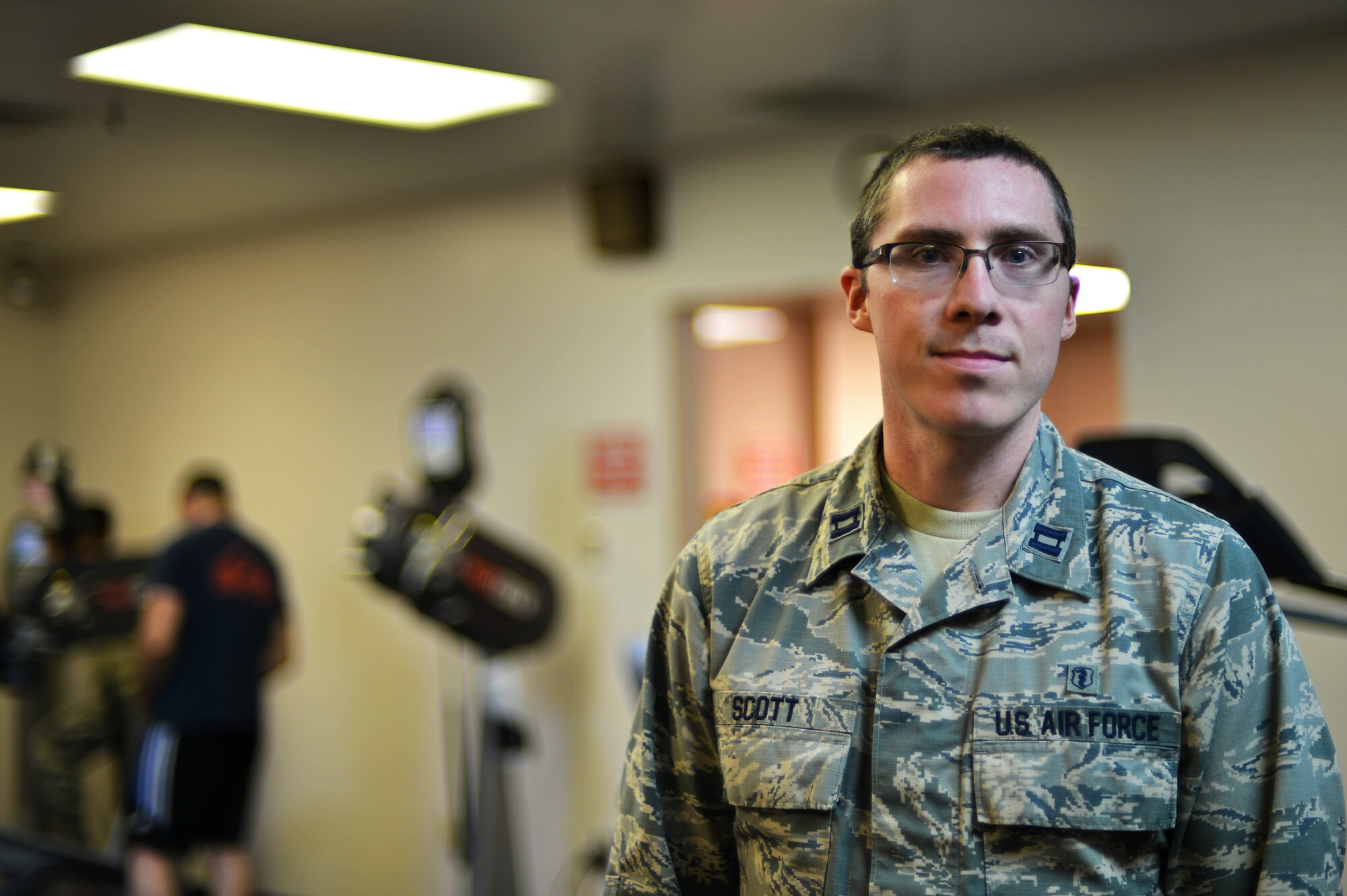 U.S. Air Force Capt. Ryan Scott, 20th Medical Group physical therapist, poses for a photo at Shaw Air Force Base, S.C., Aug. 1, 2016. Scott assists the Airmen, Soldiers and dependents on base who go through physical therapy by providing various workouts, stretches, and exercises for them. (U.S. Air Force photo by Airman 1st Class Christopher Maldonado)