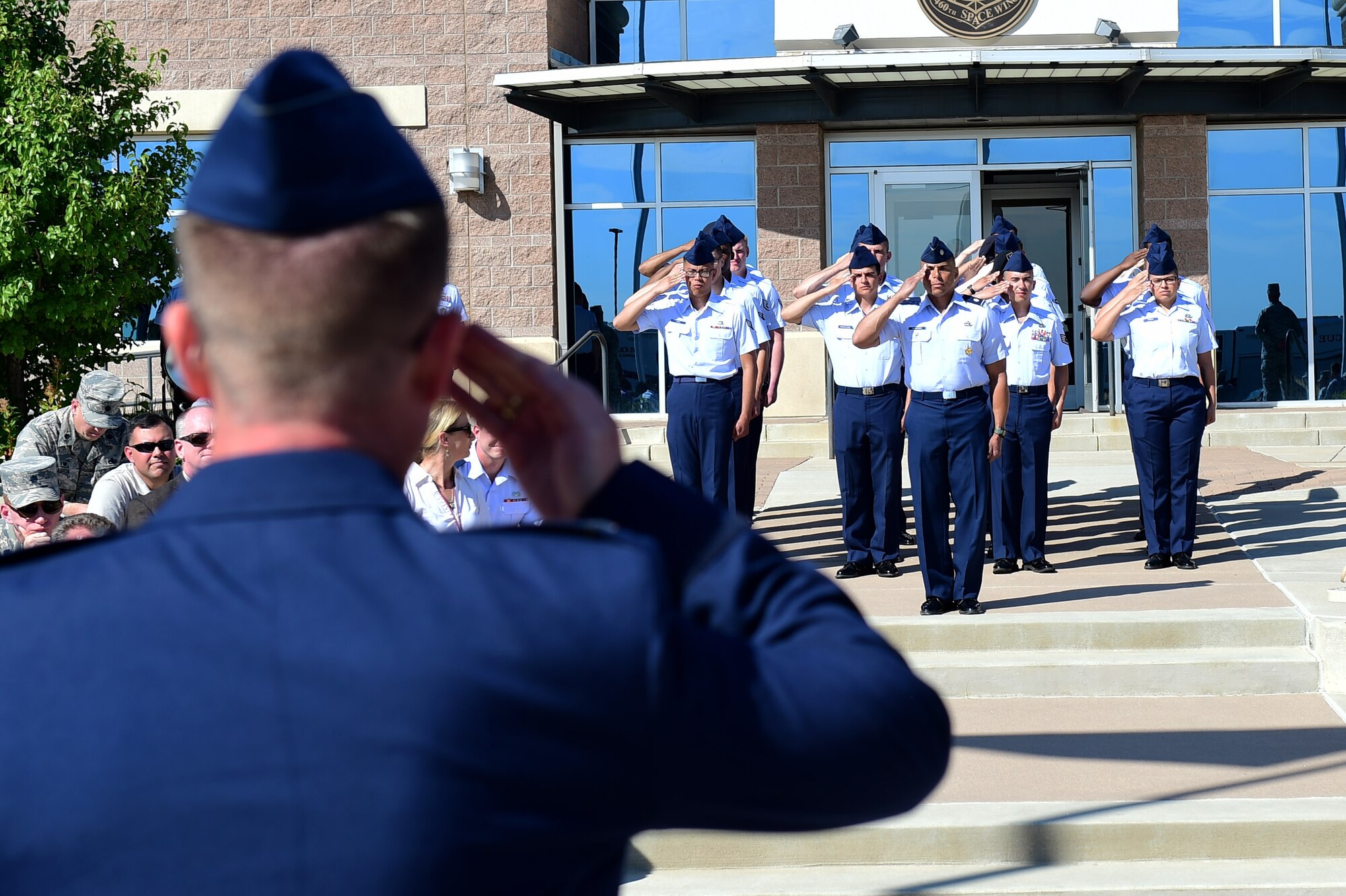 Col. Shawn Thompson, 460th Mission Support Group commander, receives his first salute from MSG members August 1, 2016, during a change of command on Buckley Air Force Base, Colo. A change of command ceremony represents the formal transfer of responsibility from an outgoing commander to their successor. (U.S. Air Force photo by Airman 1st Class Gabrielle Spradling/Released)