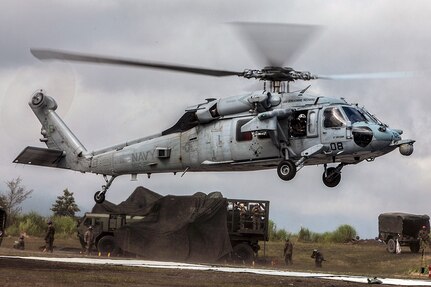 A Sikorsky MH-60S Seahawk with Helicopter Sea Combat Squadron (HSC) 25 comes in for a landing during Exercise Eagle Wrath 2016 at Combined Arms Training Center Camp Fuji, Japan, July 28, 2016. HSC-25 is home-based at Anderson Air Force Base, Guam, and detached to Naval Air Facility Atsugi, United States Ship Bonhomme Richard (LHD-6). Marine Wing Support Squadron 171 stationed at Marine Corps Air Station Iwakuni, received assistance throughout the exercise from Combat Logistics Company 36 from MCAS Iwakuni, the Low Altitude Air Defense Battalion and Marine Air Traffic Control Mobile Team from the 31st Marine Expeditionary Unit and HSC-25. 