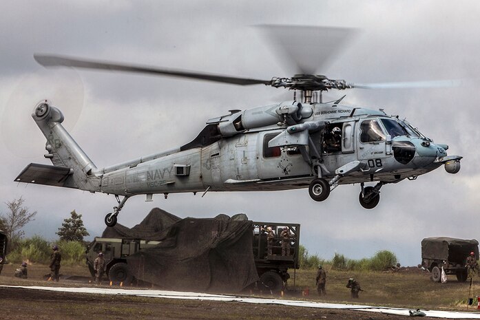 A Sikorsky MH-60S Seahawk with Helicopter Sea Combat Squadron (HSC) 25 comes in for a landing during Exercise Eagle Wrath 2016 at Combined Arms Training Center Camp Fuji, Japan, July 28, 2016. HSC-25 is home-based at Anderson Air Force Base, Guam, and detached to Naval Air Facility Atsugi, United States Ship Bonhomme Richard (LHD-6). Marine Wing Support Squadron 171 stationed at Marine Corps Air Station Iwakuni, received assistance throughout the exercise from Combat Logistics Company 36 from MCAS Iwakuni, the Low Altitude Air Defense Battalion and Marine Air Traffic Control Mobile Team from the 31st Marine Expeditionary Unit and HSC-25. 