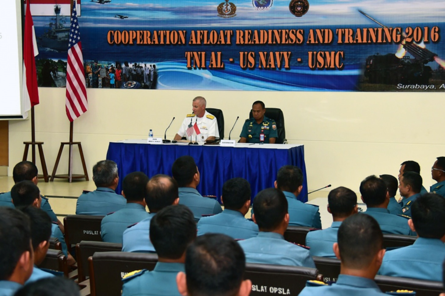 Rear Adm. Brian Hurley, Commander, Logistics Group Western Pacific, and 1st Adm. Mintoro Yulianto, Indonesian Navy (TNI-AL) Eastern Fleet Chief of Staff, preside over the opening ceremony of Cooperation Afloat Readiness and Training (CARAT) Indonesia 2016.  CARAT is a series of annual maritime exercises between the U.S. Navy, U.S. Marine Corps and the armed forces of nine partner nations to include Bangladesh, Brunei, Cambodia, Indonesia, Malaysia, the Philippines, Singapore, Thailand, and Timor-Leste.