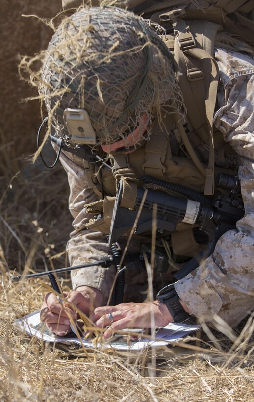 Capt. Daniel H. Zimlich, a forward air controller, with 3rd Battalion, 1st Marine Regiment, 1st Marine Division, plots coordinates on a map during a Marine Corps Readiness Evaluation at Camp Pendleton, Calif., July 28, 2016. In preparation for upcoming deployments, the training allows Marines to evaluate how efficient and effective their standard operating procedures are to handle real-life scenarios. (U.S. Marine Corps Photo by Lance Cpl. Bradley J. Morrow)