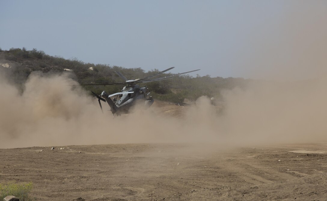 Marines from 3rd Battalion, 1st Marine Regiment, 1st Marine Division, insert into a drop zone during a Marine Corps Readiness Evaluation at Camp Pendleton, Calif., July 28, 2016. In preparation for upcoming deployments, the training provides Marines with the opportunity to conduct realistic operations in various environments. (U.S. Marine Corps Photo by Lance Cpl. Bradley J. Morrow)