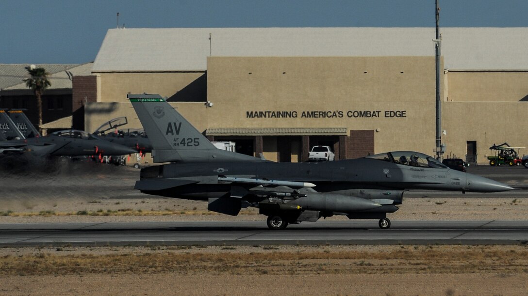 An F-16, assigned to the 555th Fighter Squadron, Aviano Air Force Base, Italy, accelerates down the runway during take-off at Nellis Air Force Base, Nev., August 2, 2016, before participation in Green Flag 16-8. Green Flag exercises provide critical joint training for approximately 75,000 joint and coalition personnel per year, including 3,000 sorties, 6,000 flight hours, and the expenditure of over 700,000 pounds of live and training ordnance. (United States Air Force photo by Airman 1st Class Kevin Tanenbaum/Released)