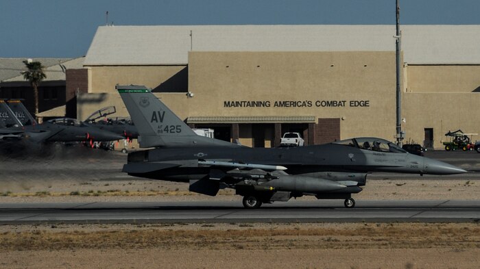 An F-16, assigned to the 555th Fighter Squadron, Aviano Air Force Base, Italy, accelerates down the runway during take-off at Nellis Air Force Base, Nev., August 2, 2016, before participation in Green Flag 16-8. Green Flag exercises provide critical joint training for approximately 75,000 joint and coalition personnel per year, including 3,000 sorties, 6,000 flight hours, and the expenditure of over 700,000 pounds of live and training ordnance. (United States Air Force photo by Airman 1st Class Kevin Tanenbaum/Released)