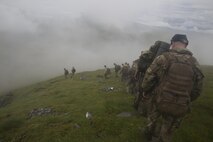 U.S. Marines, sailors and Royal Marine Commandos begin their descent from a mountain top in Inverness, Scotland, July 19, 2016, during the mountain training phase of the Tartan Eagle 16 exercise.
Tartan Eagle involved Marines and sailors from the Marine Corps Security Force Regiment and its battalion, and their British counterparts, the 43 Fleet Protection Group Royal Marines. (Official Marine Corps photo by Sgt. Calvin Shamoon/ Released)
