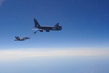 A Canadian Forces CF-18 fighter is refueled by a U.S. KC-135 tanker over Canada Aug. 1, 2016 as part of a coordinated exercise. NORAD and USSTRATCOM conducted intercept and safe passage escort procedures in all three of the NORAD regions to ensure NORAD’s rapid response capability.