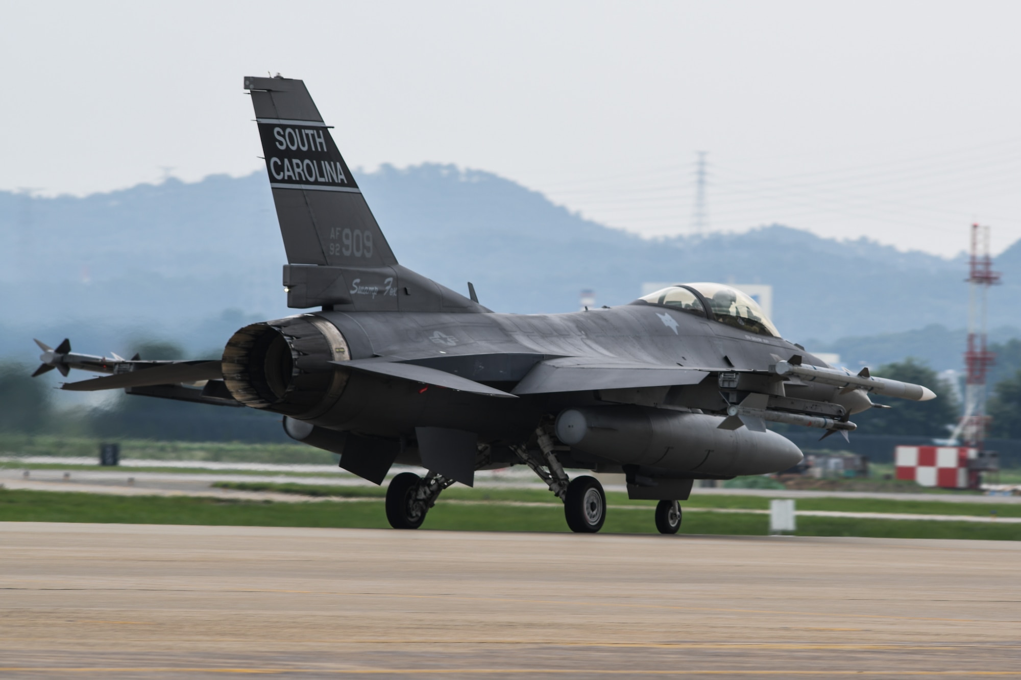 An F-16 Fighting Falcon from the South Carolina Air National Guard’s 157th Expeditionary Fighter Squadron taxis on the flightline before takeoff July 27, 2016, at Osan Air Base, Republic of Korea. Approximately 300 Airmen and 12 F-16s from the 169th Fighter Wing deployed to Osan in support of the U.S. Pacific Command Theater Security Package.  (U.S. Air Force photo by Senior Airman Dillian Bamman)