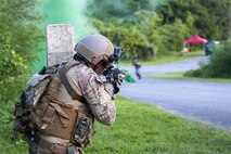 A deployed aircraft ground response element Airman with the 353rd Special Operations Support Squadron shoots blanks at an enemy target during an exercise July 27, 2016, at Kadena Air Base, Japan. The DAGRE team performs many special operations missions such as fly-away security, pararescue and combat control team escort, airfield security and personnel recovery operations. (U.S. Air Force photo by Airman 1st Class Corey M. Pettis) 