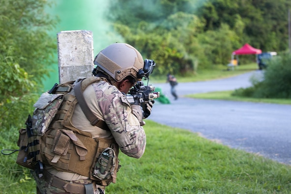 A deployed aircraft ground response element Airman with the 353rd Special Operations Support Squadron shoots blanks at an enemy target during an exercise July 27, 2016, at Kadena Air Base, Japan. The DAGRE team performs many special operations missions such as fly-away security, pararescue and combat control team escort, airfield security and personnel recovery operations. (U.S. Air Force photo by Airman 1st Class Corey M. Pettis) 