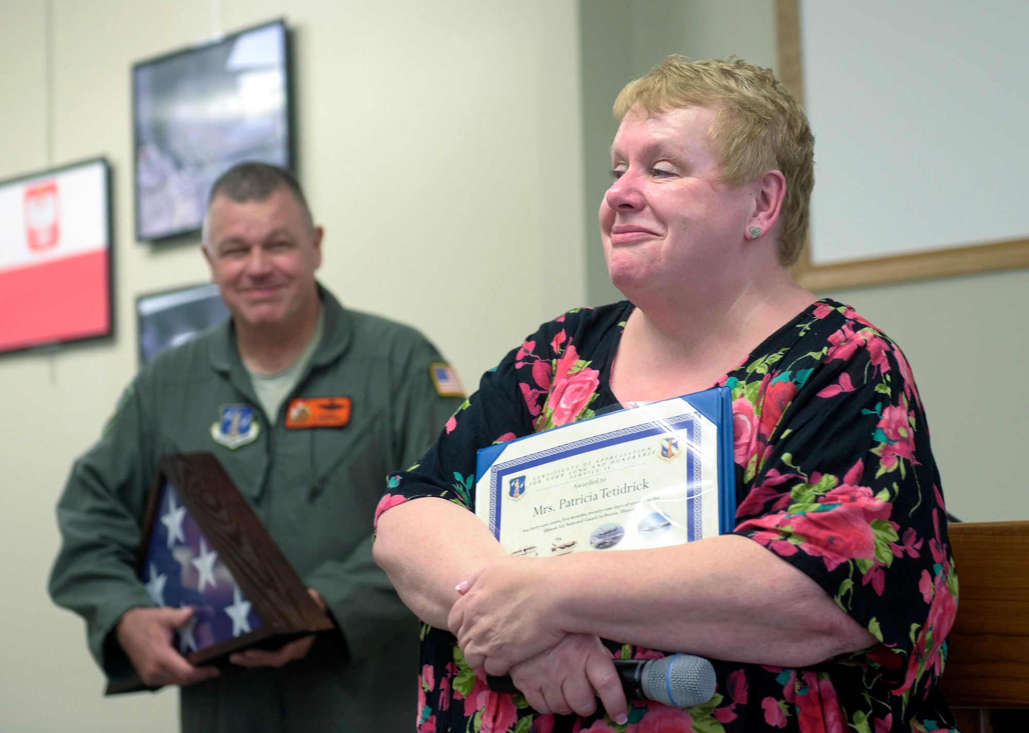 Patricia Tetidrick, an administrative support technician with the 182nd Logistics Readiness Squadron, Illinois Air National Guard, shares insight from her four decades at the 182nd Airlift Wing at a luncheon held in her honor in Peoria, Ill., July 28, 2016. Tetidrick retired Aug. 1 after 41 years, five months and 21 days of service as a Title 5 federal technician. (U.S. Air National Guard photo by Staff Sgt. Lealan Buehrer)