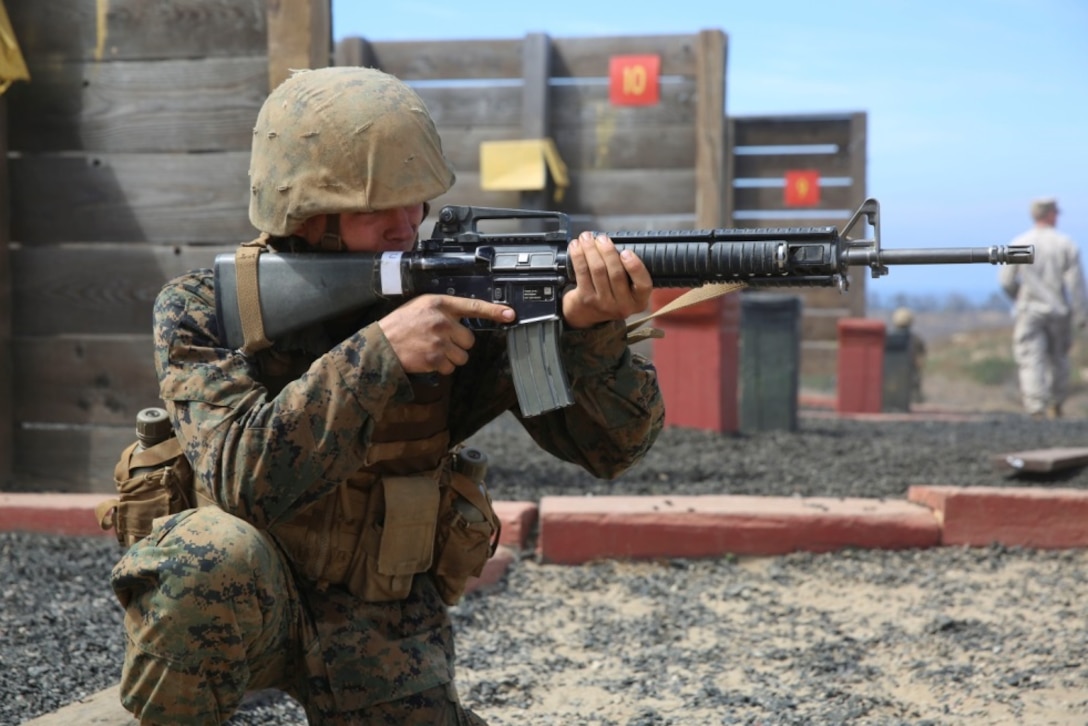 Private First Class Joe T. Hertz, Hotel Company, 2nd Recruit Training Battalion, provides security as recruits complete an event during the Crucible at Marine Corps Base Camp Pendleton, Calif., July 27. During the Crucible, Hertz was given the billet of squad leader for the second time at recruit training. Following recruit training, Hertz will report to the School of Infantry at Camp Pendleton, Calif., and then to his military occupation specialty school to become an automotive organizational mechanic.