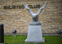 A new eagle statue dedicated to retired Master Sgt. Jim Price was unveiled in front of the base enlisted club at Osan Air Base, Republic of Korea, Aug. 1, 2016. Price, who was a Tuskegee Airman, was a staple of the enlisted club for years, offering advice and mentorship to Airmen of all ranks and ages until his death in 2008. (U.S. Air Force photo by Senior Airman Victor J. Caputo/Released)