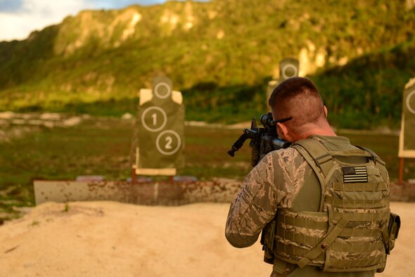 Staff Sgt. Stephen Horton, 36th Security Forces Squadron NCO in charge of resource protection and physical security, fires an M4 carbine at a target July 7, 2016, at Andersen Air Force Base, Guam. Weapons qualification is often done in preparation for deployments, for certain permanent changes of station and annually for certain career fields. (U.S. Air Force photo by Airman 1st Class Jacob Skovo)