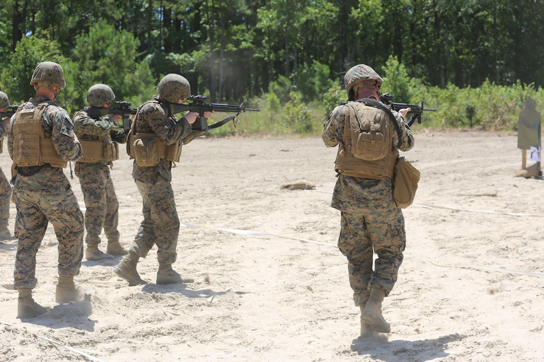 Marines with 2nd Maintenance Battalion, 2nd Marine Logistics Group, engages targets from a moving position as part of a live-fire exercise on Camp Lejeune, N.C., July 29, 2016. This exercise was the first time many of the Marines have been to the range since Marine Combat Training. (U.S. Marine Corps photo by Lance Cpl. Jon Sosner)