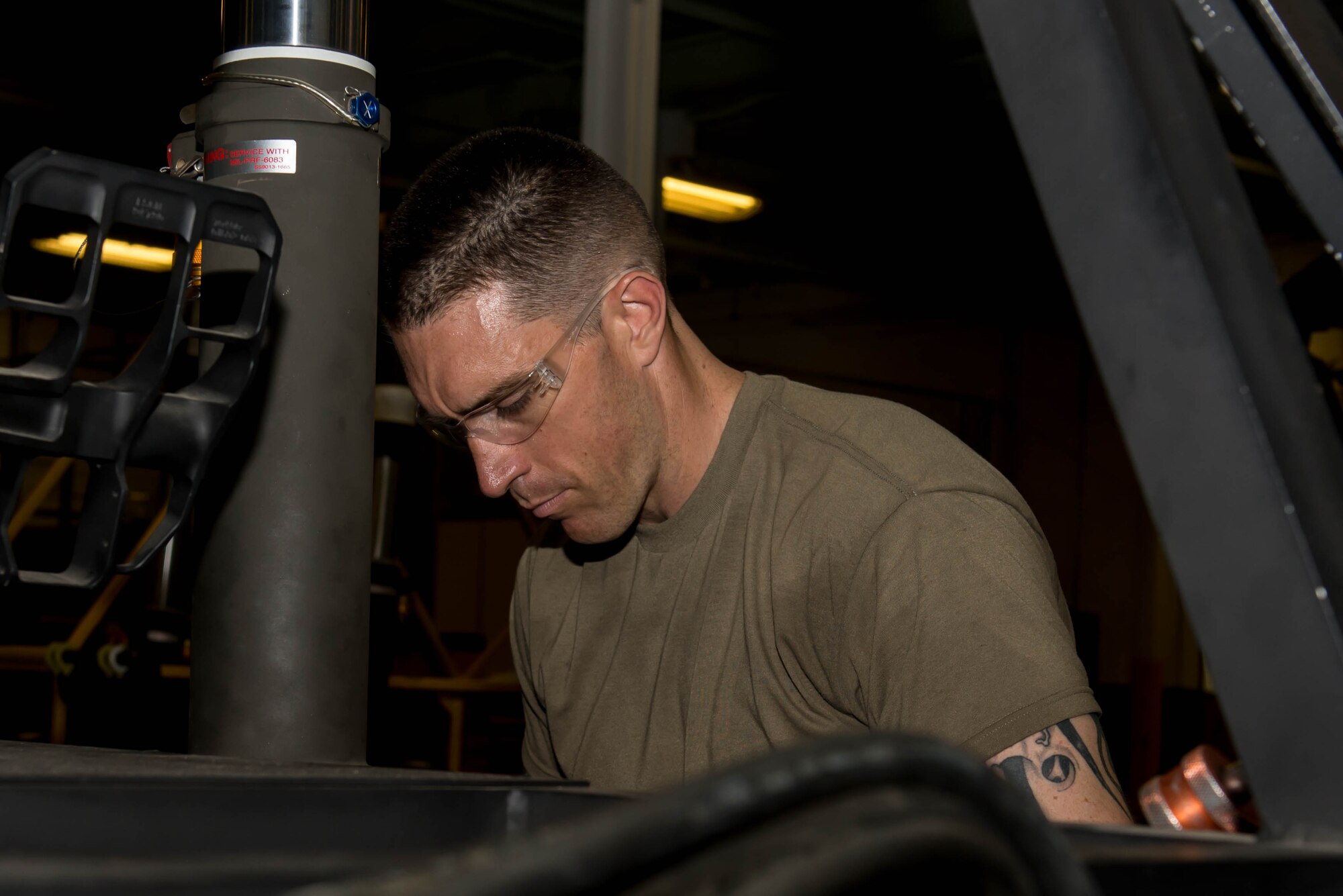 U.S. Army Spc. Daryn Colledge, 168th Aviation Regiment UH-60 Blackhawk Helicopter repair student, practices routine maintenance during class at Fort Eustis, Va., July 28, 2016. Colledge attended Boise State University, Idaho where he earned a bachelor’s degree in communication. (U.S. Air Force photo by Airman 1st Class Derek Seifert)