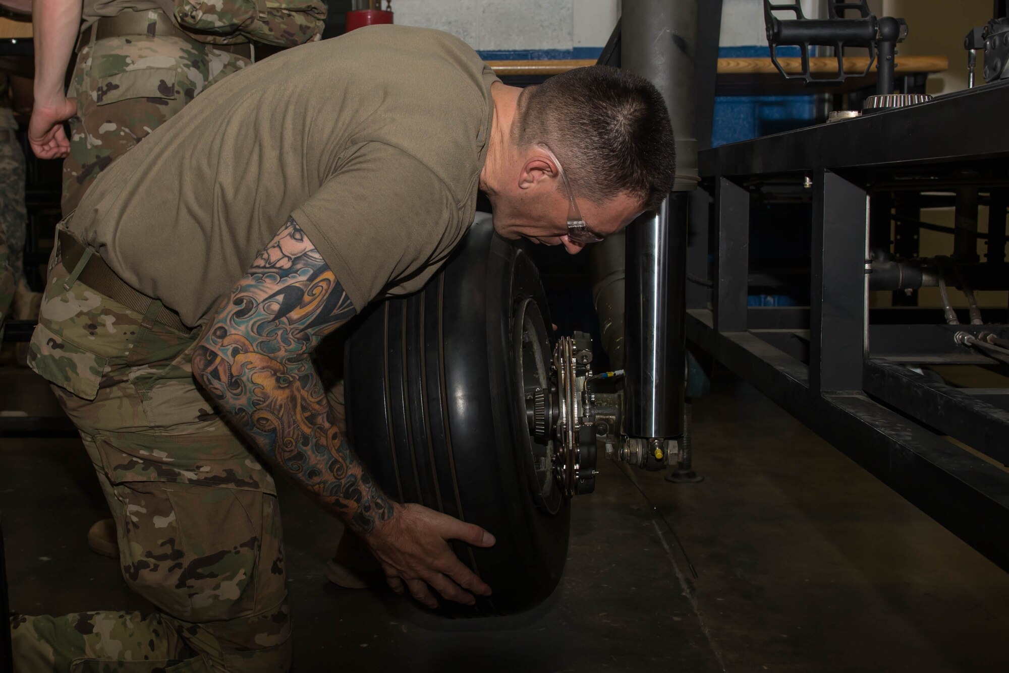 U.S. Army Spc. Daryn Colledge, 168th Aviation Regiment UH-60 Blackhawk Helicopter repair student, practices routine maintenance during class at Fort Eustis, Va., July 28, 2016. Colledge joined the National Guard so he could stay home and serve his community while serving the country at the same time. (U.S. Air Force photo by Airman 1st Class Derek Seifert)