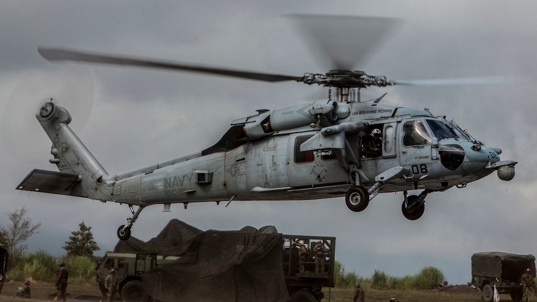 A Sikorsky MH-60S Seahawk with Helicopter Sea Combat Squadron 25 comes in for a landing during Exercise Eagle Wrath 2016 at Combined Arms Training Center Camp Fuji, Japan, July 28, 2016. HSC-25 is home-based at Anderson Air Force Base, Guam, and detached to Naval Air Facility Atsugi, United States Ship Bonhomme Richard. Marine Wing Support Squadron 171 stationed at Marine Corps Air Station Iwakuni, received assistance throughout the exercise from Combat Logistics Company 36 from MCAS Iwakuni, the Low Altitude Air Defense Battalion and Marine Air Traffic Control Mobile Team from the 31st Marine Expeditionary Unit and HSC-25. 