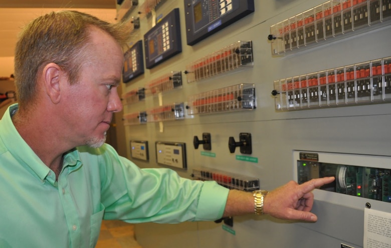 Operator Trainee Les Rice checks the integrity of line relays inside a control center at Thurmond Dam July 6. Rice sends a carrier current signal down the line and waits for a response from the receiving protective relay. Rice is a 4th-year trainee of the Savannah District's Operator Training Program. The program is part of a federal pathways initiative that shuffles trainees through a comprehensive plant management program at the district's three dams. 