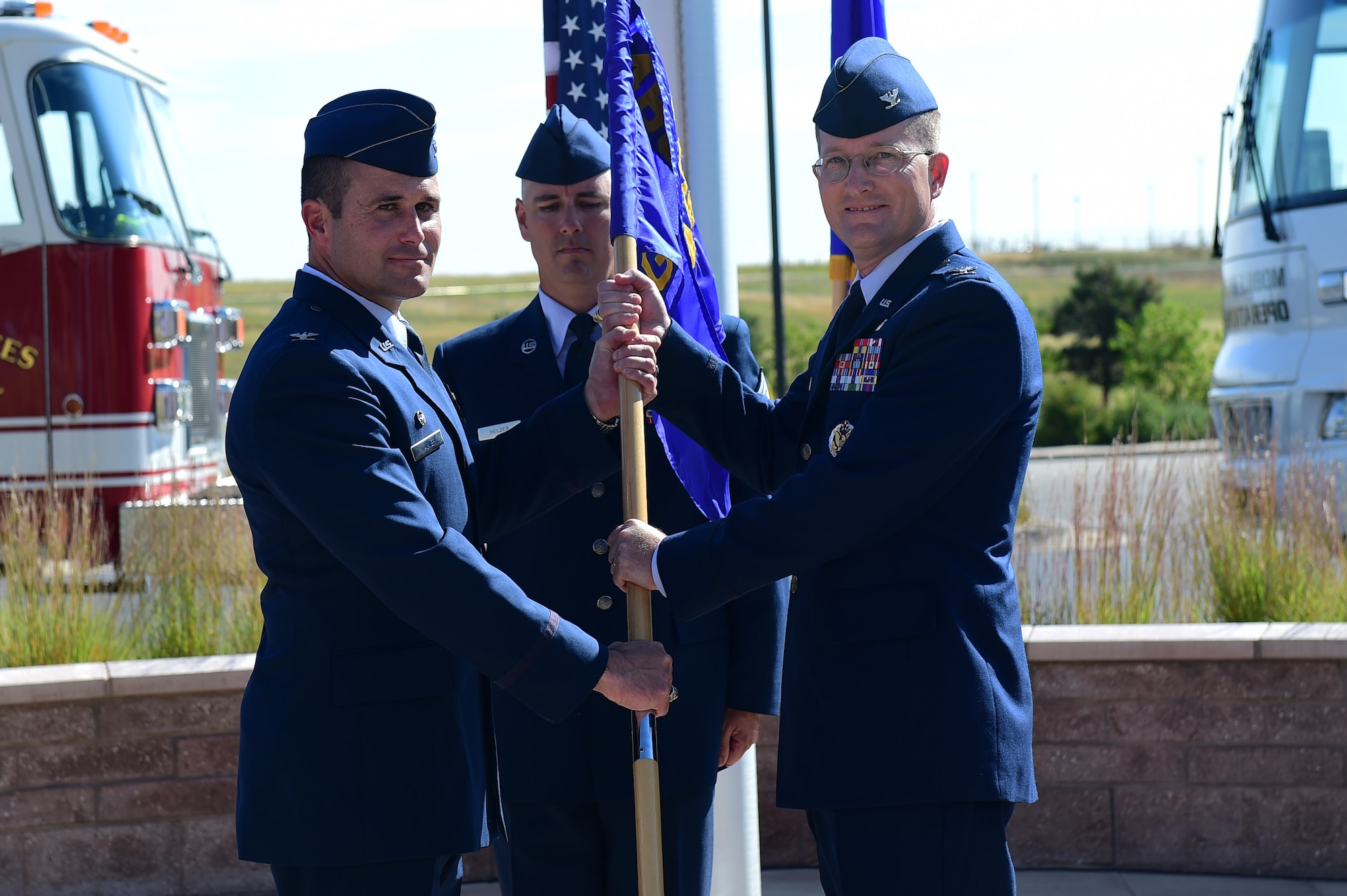 Col. Shawn Thompson, Commander of the 460th Mission Support Group, assumes command August 1, 2016, during the MSG change of command on Buckley Air Force Base, Colo. A change of command ceremony represents the formal transfer of responsibility from an outgoing commander to their successor. (U.S. Air Force photo by Airman 1st Class Gabrielle Spradling/Released)
