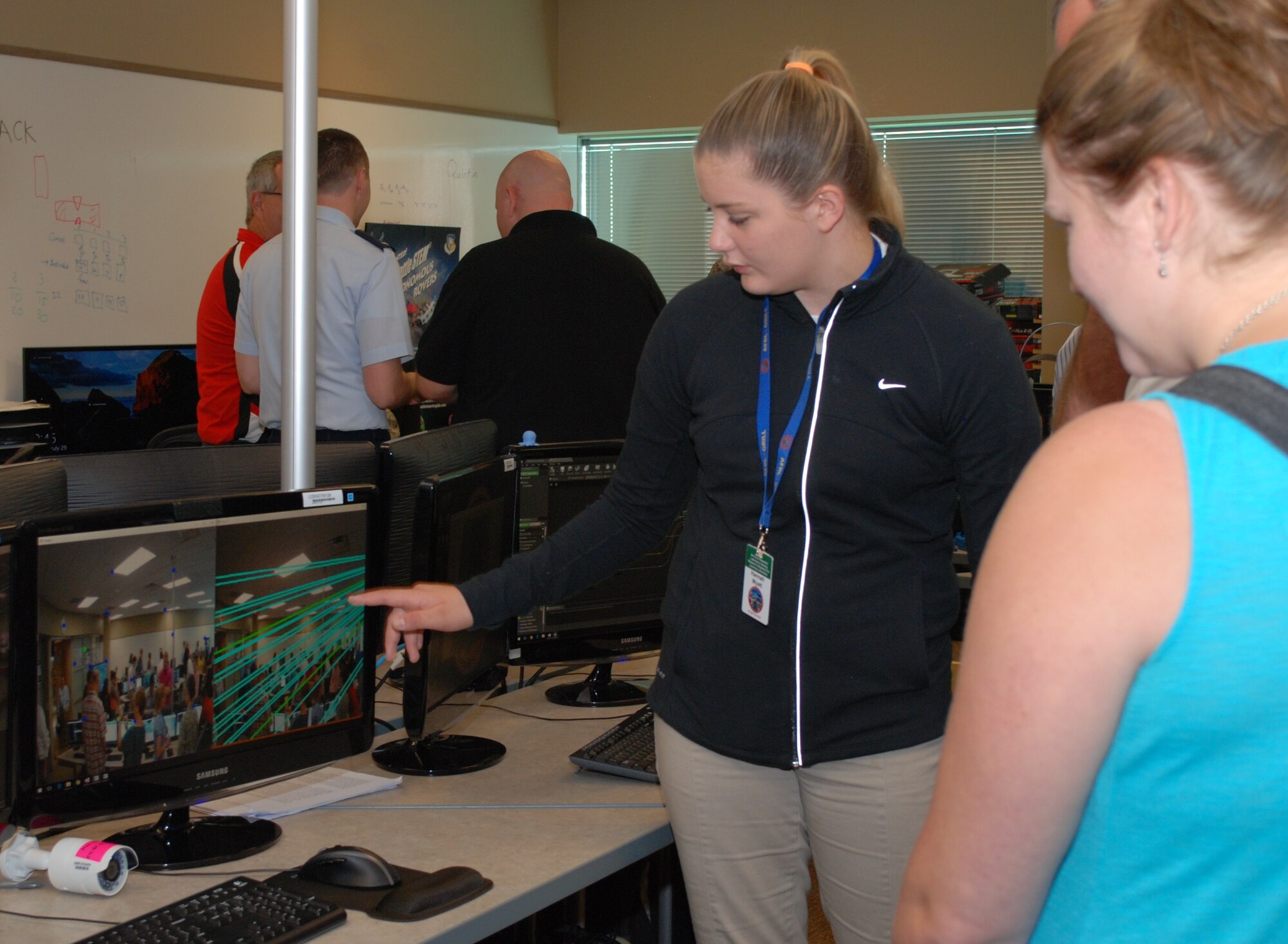 Wright Scholar Hannah Wyatt demonstrates her summer project titled Indoor Object Tracking to attendees during Demo Day July 29 at the Wright Brothers Institute’s Tec^Edge Innovation & Collaboration Center. Wyatt, a first-year intern, is a 2016 Beavercreek High School graduate and will be attending the University of Dayton in the fall to study civil engineering. (U.S. Air Force Photo / Gina Marie Giardina)