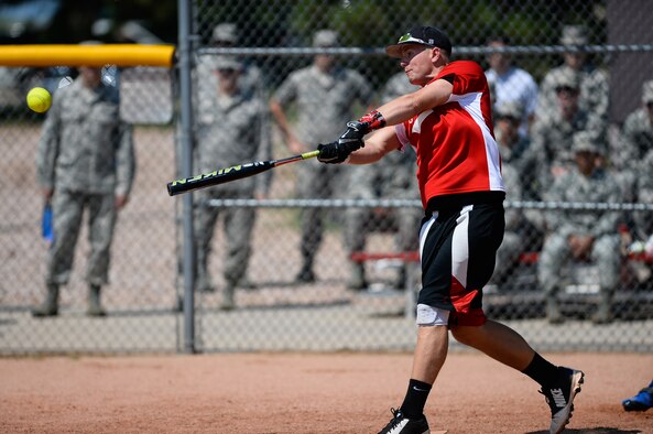 Cameron White, 3rd Space Operations Squadron, rips a 3-RBI single during the intramural softball championship game at Schriever Air Force Base, Colorado, Tuesday, Aug. 2, 2016. White’s three RBI were part of a 7-run sixth inning that propelled 3 SOPS to its second straight title with an 11-4 win over the 4th Space Operations Squadron. (U.S. Air Force photo/Christopher DeWitt)