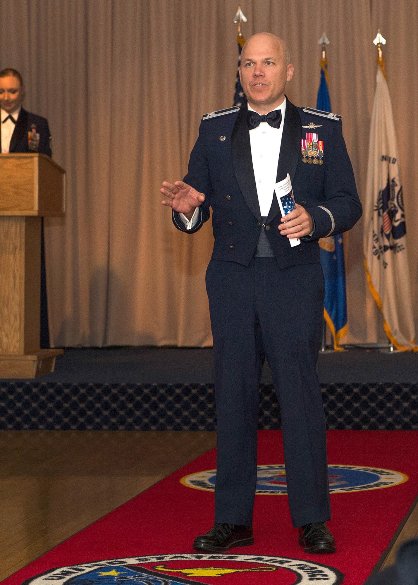 Col. Roman L. Hund, 66th Air Base Group commander, speaks during the Airman Leadership School graduation ceremony at the Minuteman Commons July 29. Hund assumed command of the group during a change of command ceremony July 26. (U.S. Air Force photo by Jerry Saslav)