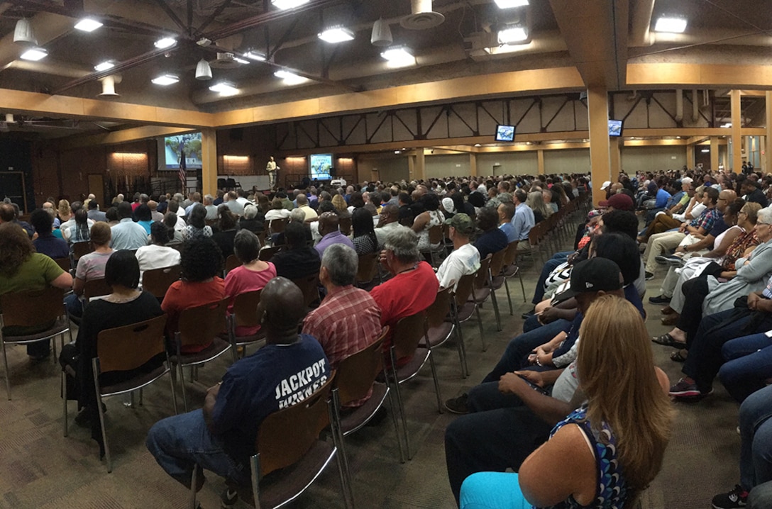An audience of about 1,000 employees listens as DLA Director Air Force Lt. Gen. Andy Busch gives an update on activities and trends in the agency during the DLA Aviation Town Hall July 29.