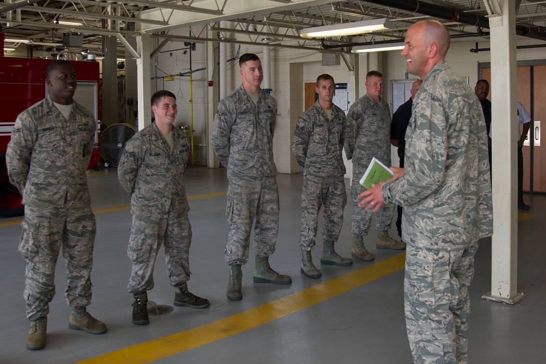 Col. John Teichert, 11th Wing and Joint Base Andrews commander, addresses members 11th Civil Engineer Squadron at Fire Station One at JBA, Md., Aug. 1, 2016. Teichert visited several of the 11th Mission Support Group squadrons with Chief Master Sgt. Beth Topa, 11th WG command chief master sergeant, to become more familiar with the squadrons’ missions and meet with “America’s Airmen.” (U.S. Air Force photo by Airman 1st Class Rustie Kramer)