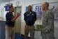Col. John Teichert (right), 11th Wing and Joint Base Andrews commander, discusses potential gym improvements with Isaac Melendez (left), 11th Force Support Squadron fitness director, at the West Fitness Center on JBA, Md., Aug. 1, 2016. Teichert visited several of the 11th Mission Support Group squadrons to become more familiar with the squadrons’ missions and meet with “America’s Airmen."  (U.S. Air Force photo by Airman 1st Class Rustie Kramer)