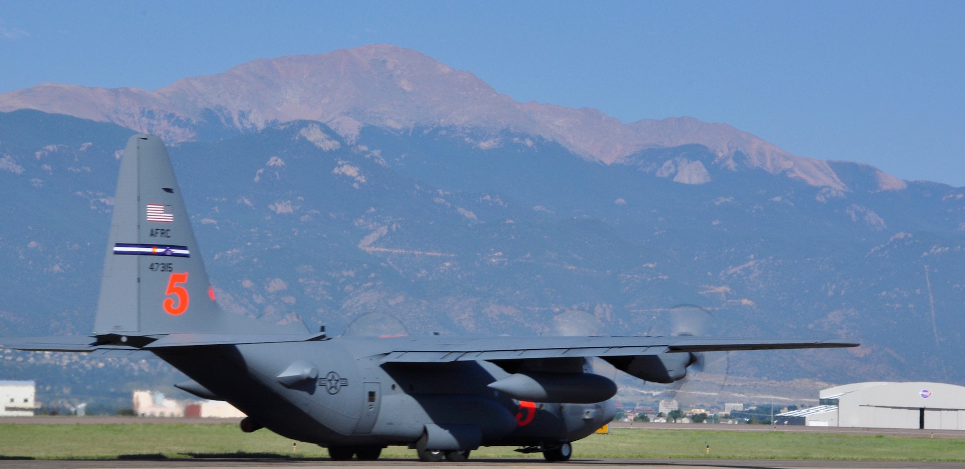 A 302nd Airlift Wing Modular Airborne Fire Fighting System-equipped C-130H taxis on the runway at Peterson Air Force Base early Aug. 3, 2016. MAFFS was activated to assist with fire fighting efforts in the Western states. This is the first MAFFS activation of the season. (U.S. Air Force photo/Daniel Butterfield) 