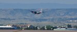 A 302nd Airlift Wing Modular Airborne Fire Fighting System-equipped C-130H departs Peterson Air Force Base early Aug. 3, 2016 enroute Boise Tanker Base, Idaho. MAFFS was activated to assist with U.S. Forest Service fire fighting efforts in the Western states. (U.S. Air Force photo/Daniel Butterfield)