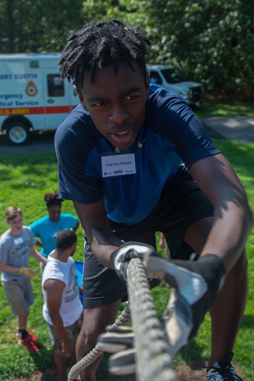 Cam’ryn Rascoe, Youth Leadership Alliance of the Virginia Peninsula Chamber Foundation student, climbs an obstacle on the leadership response course at Fort Eustis, Va., August 1, 2016. During the course, students enhanced leadership skills through touring a variety of industries, and speaking with community leaders. (U.S. Air Force photo by Staff Sgt. J.D. Strong II)