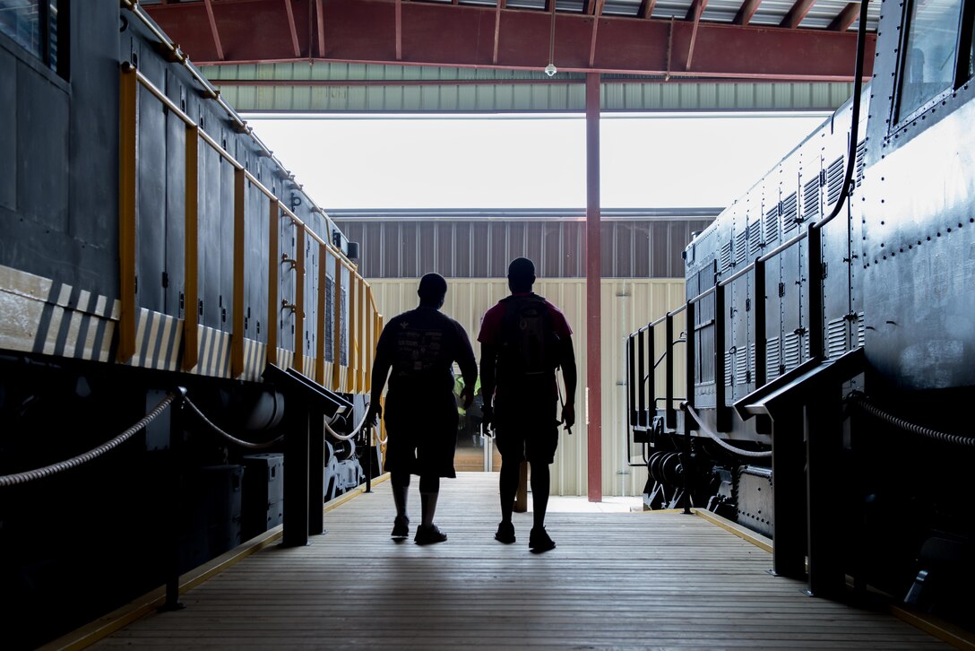 Jemal Harris, Youth Leadership Alliance of the Virginia Peninsula Chamber Foundation, program manager and Jonathan Sims, program assistant, tour the U.S. Army Transportation Museum at Fort Eustis, Va., August 1, 2016. The group learned about the U.S. Army’s transportation history after completing the leadership response course. (U.S. Air Force photo by Staff Sgt. J.D. Strong II)