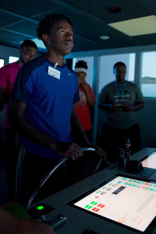 Cam’ryn Rascoe, Youth Leadership Alliance of the Virginia Peninsula Chamber Foundation student, uses a Logistic Support Vessel simulator at the Fort Eustis Simulator Training Center at Fort Eustis, Va., August 1, 2016. The group was given the opportunity to try different simulators to experience the type of equipment soldiers operate during training.(U.S. Air Force photo by Staff Sgt. J.D. Strong II)