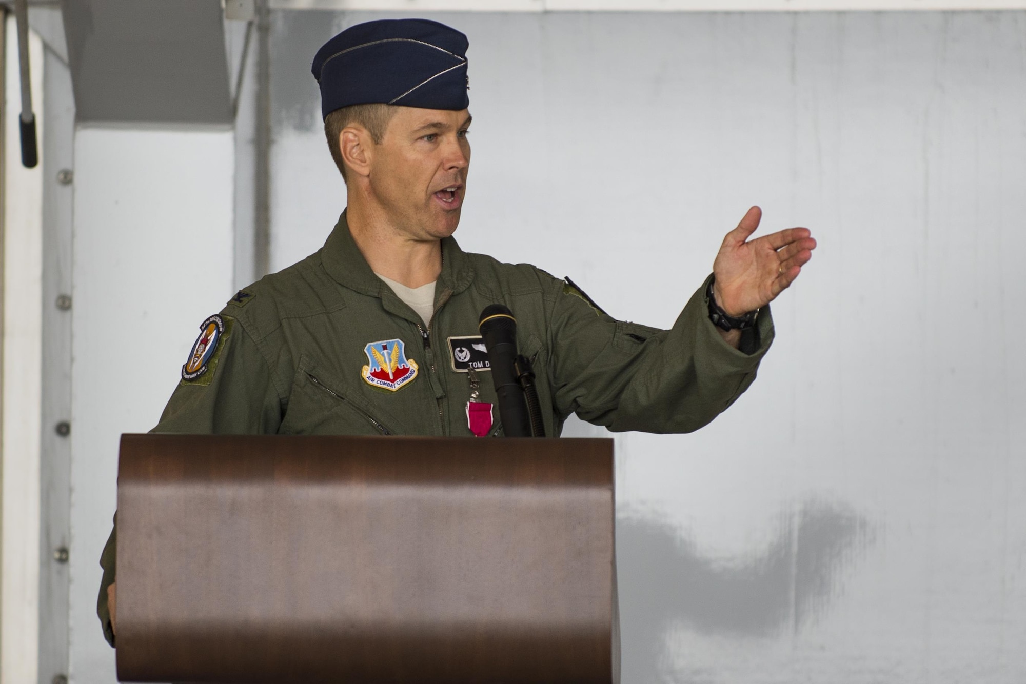 U.S. Air Force Col. Thomas Dorl, 347th Rescue Group commander, gives remarks before relinquishing command, Aug. 2, 2016, at Moody Air Force Base, Ga. While commanding the 347th RQG, Dorl’s leadership guided Moody’s acquisition of nine new HC-130J Combat King IIs and a flight simulator. (U.S. Air Force photo by Airman Daniel Snider) 