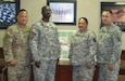 Pictured is a small group of the taskforce selected by Defense Logistics Agency Distribution Center to conduct wall-to-wall inventory in preparation for audit readiness later this year. (Left to right) Sgt. Jason Brothers, a military policeman with the 450th Military Police Detachment in Birmingham, Alabama and Soldiers with the Army Reserve Sustainment Command also in Birmingham: Staff Sgt. Kareem Hill, unit supply specialist, Sgt. 1st Class Tammy Binder, human resources specialist and Sgt. 1st Class Bobby Hill, automated logistics specialist. The taskforce successfully completed the wall-to-wall inventory on July 28. 