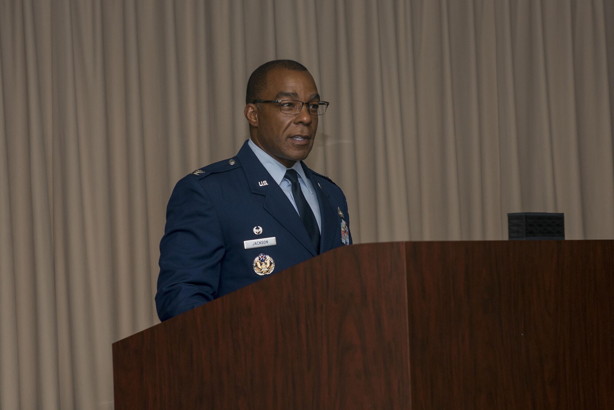 Col. Robert S. Jackson Jr., Air Force Manpower Analysis Agency commander, gives remarks about the impact the 3rd Manpower Requirements Squadron has had during the deactivation ceremony of the 3rd MRS July 28, 2016 at Scott Air Force Base, Ill. The “Third” is one of five squadrons assigned to the AFMAA located at Joint Base San Antonio – Randolph Air Force Base, Texas. (U.S. Air Force photo/Senior Airman Joshua Eikren)