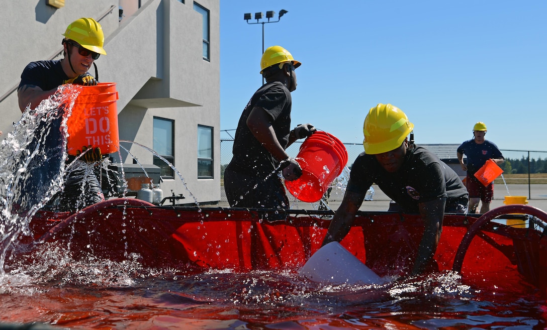 Team McChord firefighters host firefighter combat challenge