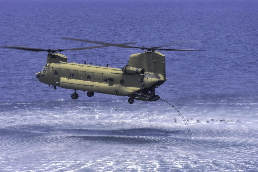 A CH-47 Chinook assigned to Joint Task Force-Bravo’s 1st Battalion, 228th Aviation Regiment gets in position for members of the Belize Coast Guard to board during training off the coast of Belize City, July 18, 2016. As the only forward deployed aviation assets in the U.S. Southern Command theater, the 1-228th AVN facilitates USSOUTHCOM Theater Engagement Strategy that includes building partner nation capacity to conduct counter-transnational organized crime operations. (U.S. Air Force photo by Staff Sgt. Siuta B. Ika)
