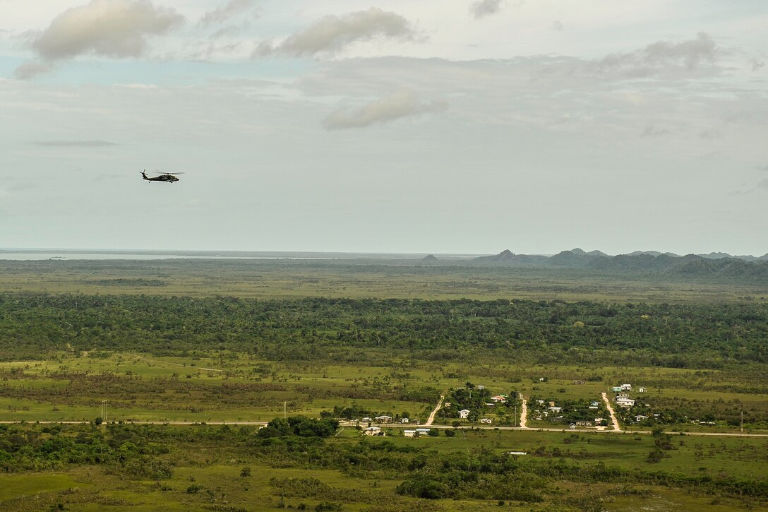 A UH-60 Black Hawk assigned to Joint Task Force-Bravo’s 1st Battalion, 228th Aviation Regiment flies over Belize District during training July 20, 2016. The 1-228th AVN conducts aviation operations in support of partner nation counter-transnational organized crime training throughout the U.S. Southern Command area of responsibility. (U.S. Air Force photo by Staff Sgt. Siuta B. Ika)