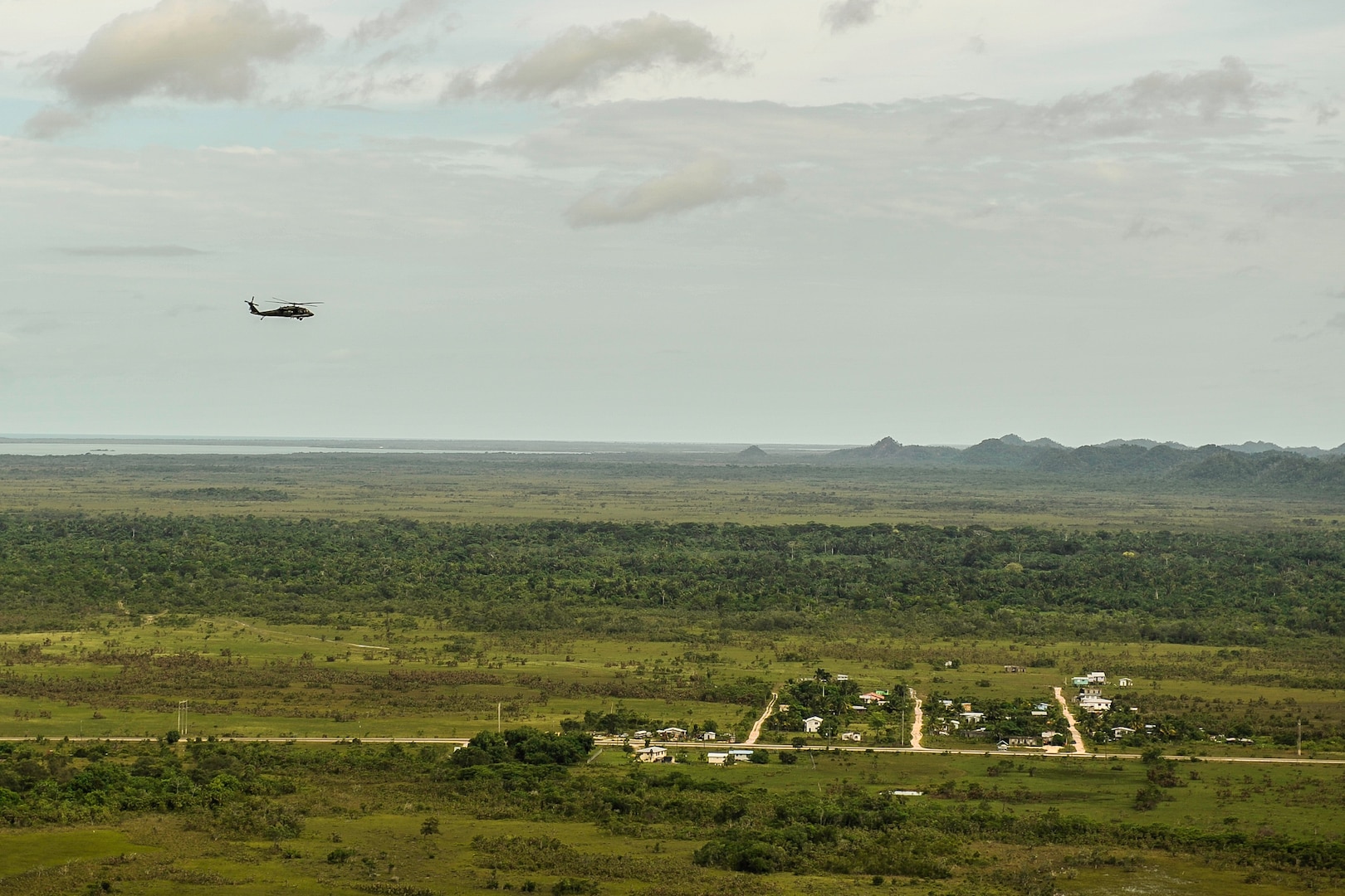 A UH-60 Black Hawk assigned to Joint Task Force-Bravo’s 1st Battalion, 228th Aviation Regiment flies over Belize District during training July 20, 2016. The 1-228th AVN conducts aviation operations in support of partner nation counter-transnational organized crime training throughout the U.S. Southern Command area of responsibility. (U.S. Air Force photo by Staff Sgt. Siuta B. Ika)