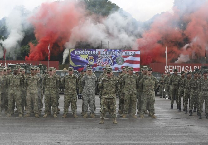 Soldiers from The U.S. Army Task Force Blackhawk and Malaysian Armed forces gather at the parade field for the Keris Strike 2016 opening ceremony in Pulada, Malaysia on July 25, 2016. Participation in this combined exercise strengthens military-to-military cooperation while focusing on international peacekeeping operations. 