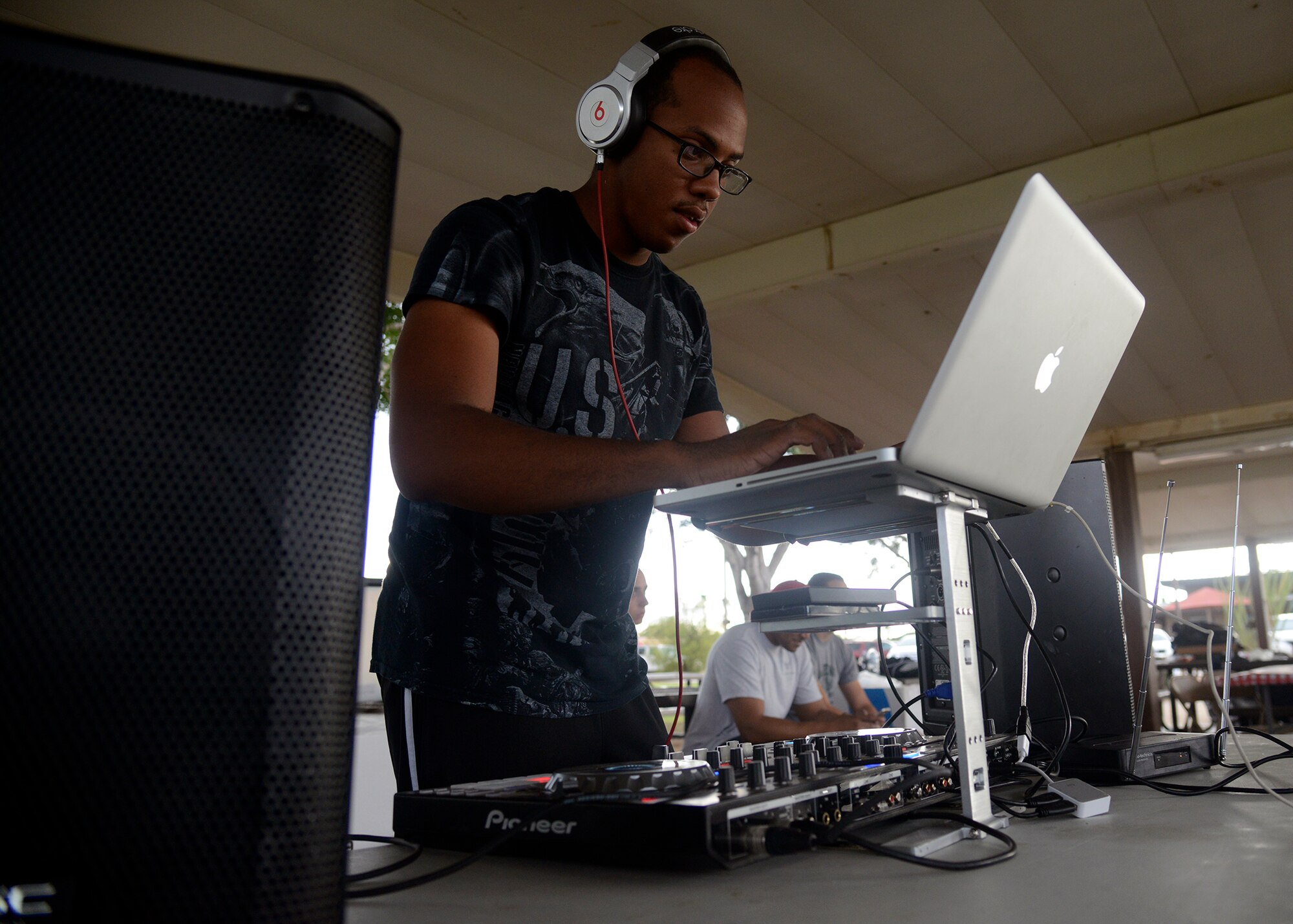 Senior Airman Kevin Liverpool, 56th Logistics Readiness Squadron cargo movement technician, provides music for the Back to School Bash Aug. 2, 2016 at Luke Air Force Base, Ariz. The event was sponsored by the Luke Chapel as a way to give back to the community as well as prepare children for the upcoming school year. More than 500 people came out for the event.(U.S. Air Force photo by Senior Airman Devante Williams)