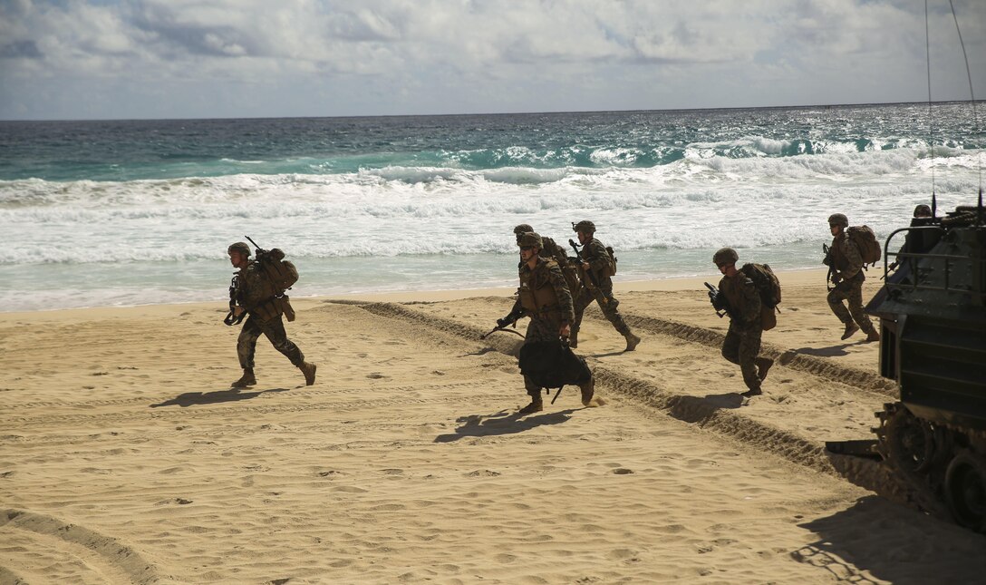U.S. Marines with Company E, Battalion Landing Team 2nd Battalion, 3rd Marine Regiment, assault a beach during Rim of the Pacific 2016. The assault was launched from USS San Diego and commanded by III Marine Expeditionary Force units aboard USS America. Twenty-six nations, more than 40 ships and submarines, more than 200 aircraft and 25,000 personnel are participating in RIMPAC from June 30 to Aug. 4, in and around the Hawaiian Islands and Southern California. The world's largest international maritime exercise, RIMPAC provides a unique training opportunity that helps participants foster and sustain the cooperative relationships that are critical to ensuring the safety of sea lanes and security in the world's oceans. RIMPAC 2016 is the 25th exercise in the series that began in 1971.