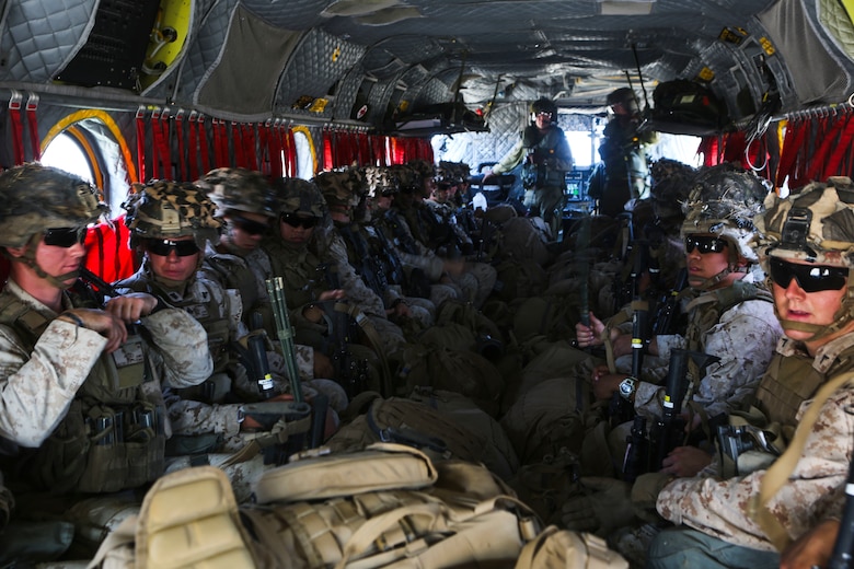 Marines with 3rd Battalion, 1st Marine Regiment board the Royal Canadian Air Force’s CH-147F Chinook during a training exercise aboard Marine Corps Base Camp Pendleton, Calif., July 28. Marine Heavy Helicopter Squadron (HMH) 462 and the Royal Canadian Air Force supported 3rd Battalion, 1st Marine Regiment during Rim of the Pacific (RIMPAC) 2016. (U.S. Marine Corps Photo by Lance Cpl. Harley Robinson/Released)
