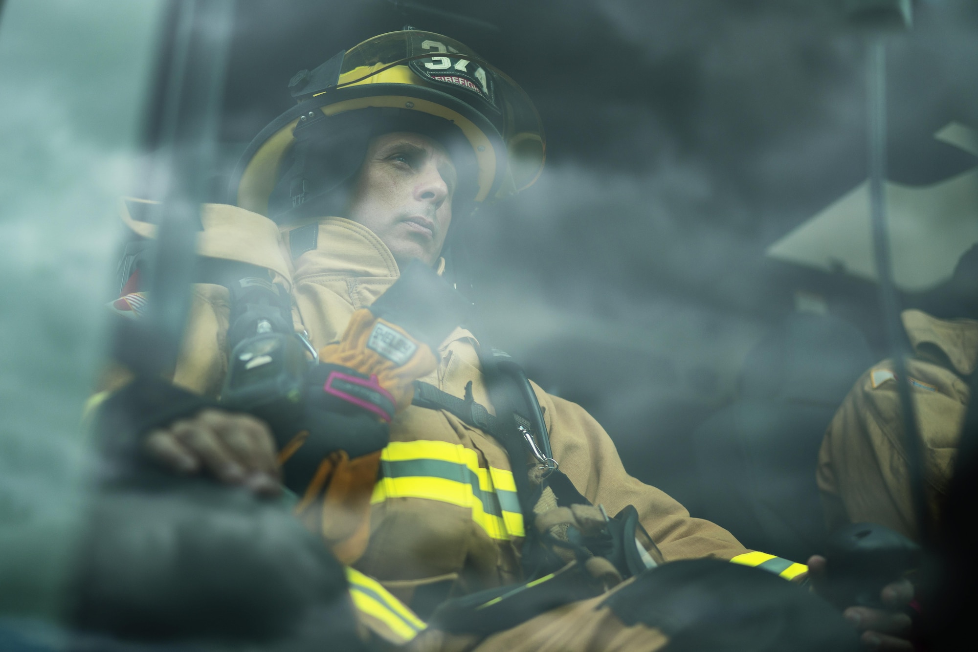 Col. Scott Maskery, 374th Mission Support Group commander, operates a fire truck hose during fire training at Yokota Air Base, Japan, Aug. 1, 2016. To learn more about how Yokota firefighters operate, Maskery trained alongside the ‘fire dogs’ to enhance his ability to advocate and fight on their behalf. (U.S. Air Force photo by Senior Airman Delano Scott/Released)