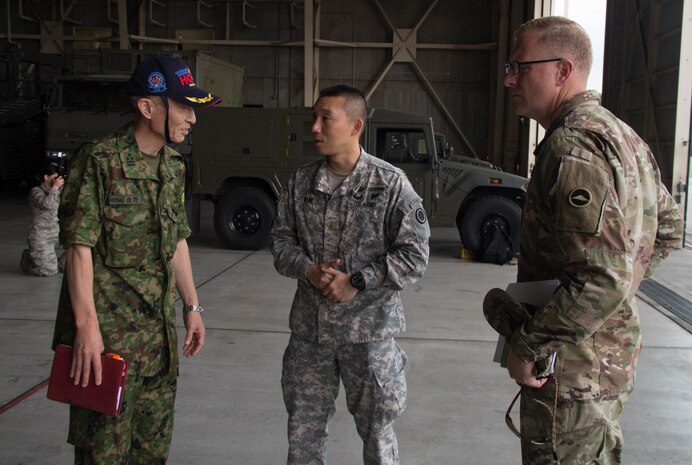 Army Lt. Col. Bryan C. Jones, commander, U.S. Army Aviation Battalion-Japan, explains his command’s aviation assets and capabilities during the second Tachikawa Helicopter Conference conducted July 26, 2016, in Camp Tachikawa, Japan. Hosted by the JGSDF Eastern Army, the conference brought together representatives from the Japan Self-Defense Forces, United States military branches, and Japan’s civil aviation authorities to exchange information and develop policies to conduct helicopter operations during a major disaster. As the only rotary wing battalion stationed in Japan, USAABJ serves as U.S. Army Japan’s primary asset for aviation support. USAABJ’s close partnership with its Japanese aviation counterparts has produced a bilateral agreement for the battalion to assist in an emergency response operation or disaster relief mission if the Japanese government requests it.  (U.S. Army photo by Sgt. John L. Carkeet IV, U.S. Army Japan)