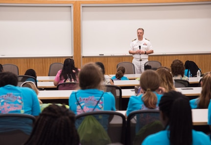 SPAWAR Systems Center Atlantic Commanding Officer, Capt. Scott D. Heller speaks to students at the Girls Day Out Summer Camp held July 29 - 30, 2016 at the College of Charleston.